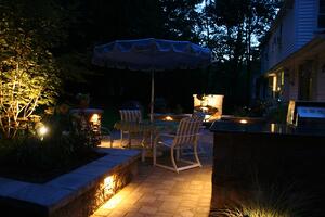 Paver Patio at night with Outdoor Landscape Lighting