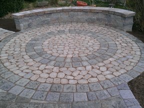 Small Circle Patio with Antika and Mini Creta Sitting Wall