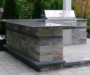 Outdoor Kitchen and Bar on Paver Patio by Bahler Brother in CT, Western MA