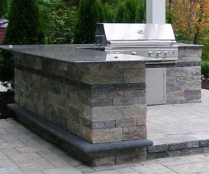 Outdoor Kitchen and Bar on Paver Patio by Bahler Brother in CT, Western MA