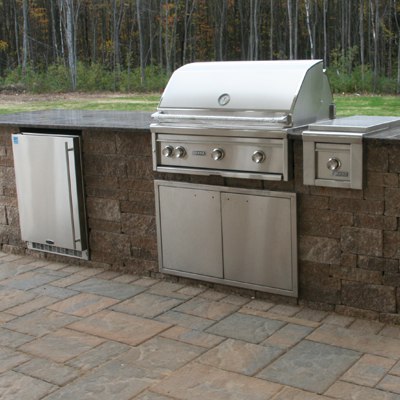 Outdoor Grill Island with Lynx Grill and Side Burner on Patio by Bahler Brothers in CT, Western MA