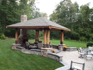 Multi-Level Paver Patio with Stone Fireplace and Bungalow
