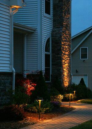 Landscape Lighting on Walkway and Uplighting a Chimney