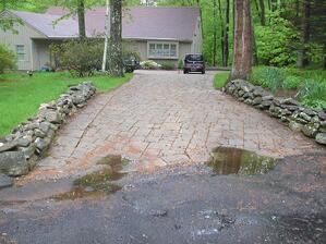 pothole in asphalt driveway resized 600