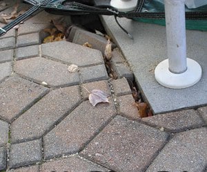 pavers along a fixed edge are disappearing