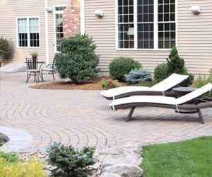 Paver Patio lounging area with Landscaping