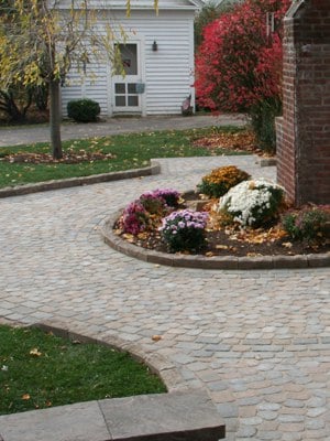 Walkway with polymeric sand in the joints.