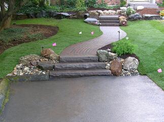 Improving Curb Appeal with Paver Walkway Steps and Landscape Lighting by Bahler Brothers