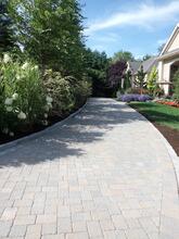 Landscaping Complements a Paver Driveway