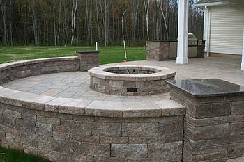 Paver patio with sitting wall and fire pit