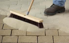 sweeping-poly-sand-into-paver-joints