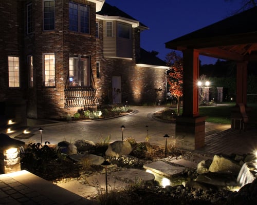 Brick home with patio lighting