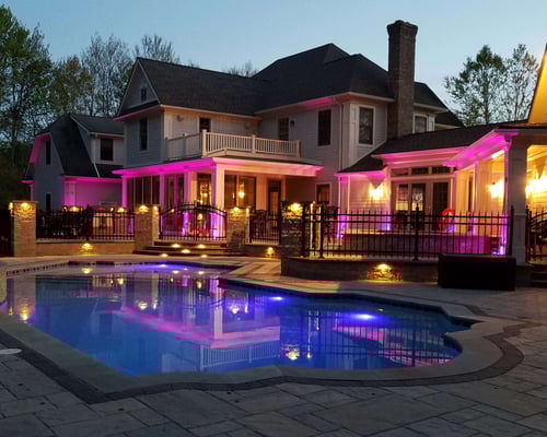Patio and pool with colored lights